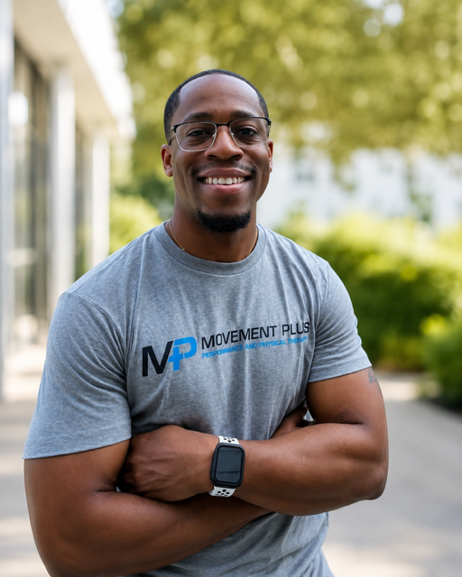 Dr. Micah McMillan smiling outdoors in Movement Plus apparel